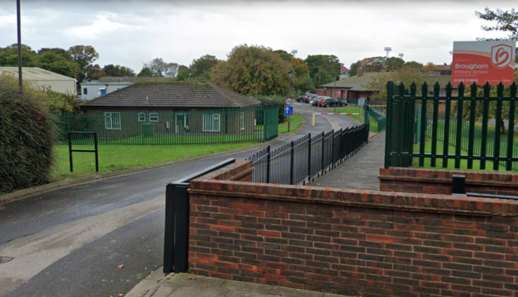 Photo of road alongside a primary school