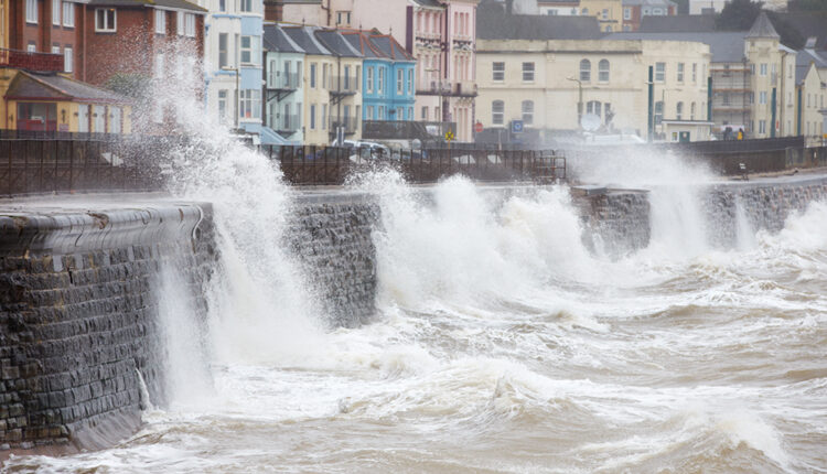Large waves breaking against the sea wall at Dawlish, Devon