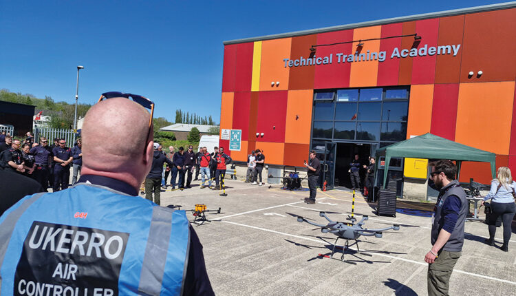 man operating drone