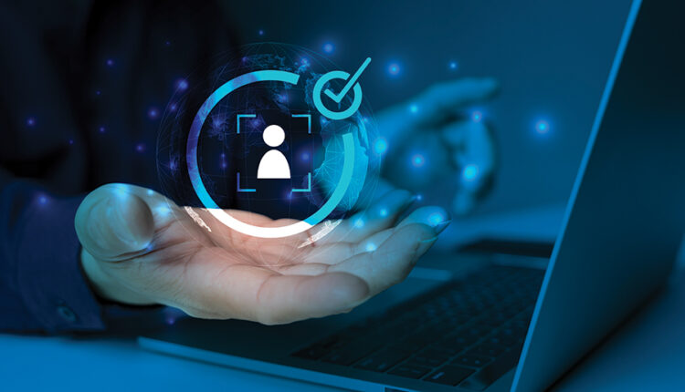 Businessman holding identity verification symbol for Increase financial security